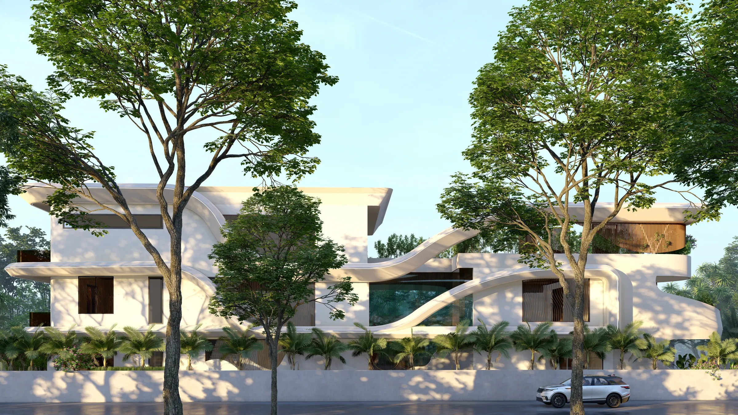 The Wave House, a curved white villa designed by L&E Architects
